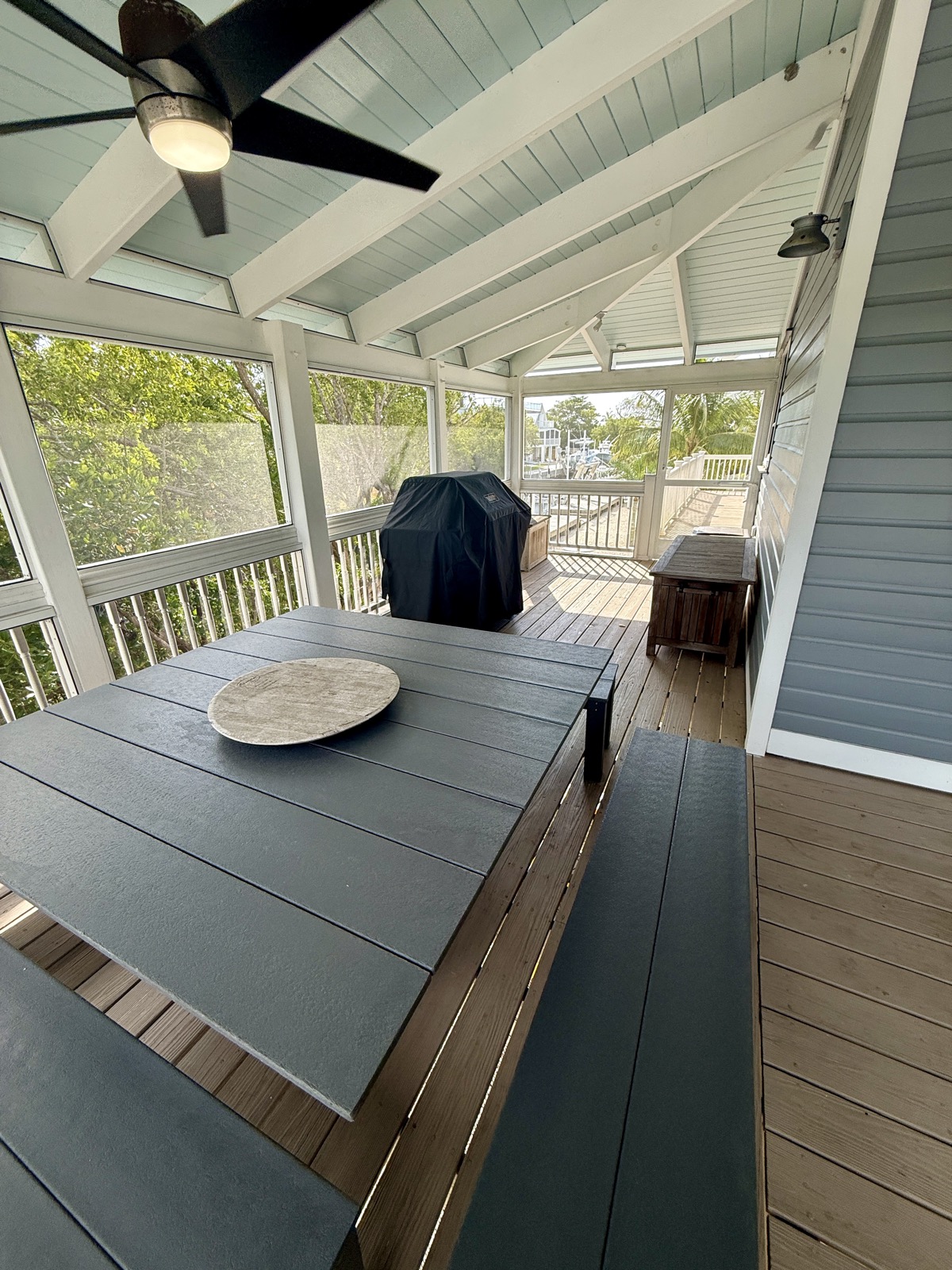 Screened porch with grill and preserve views