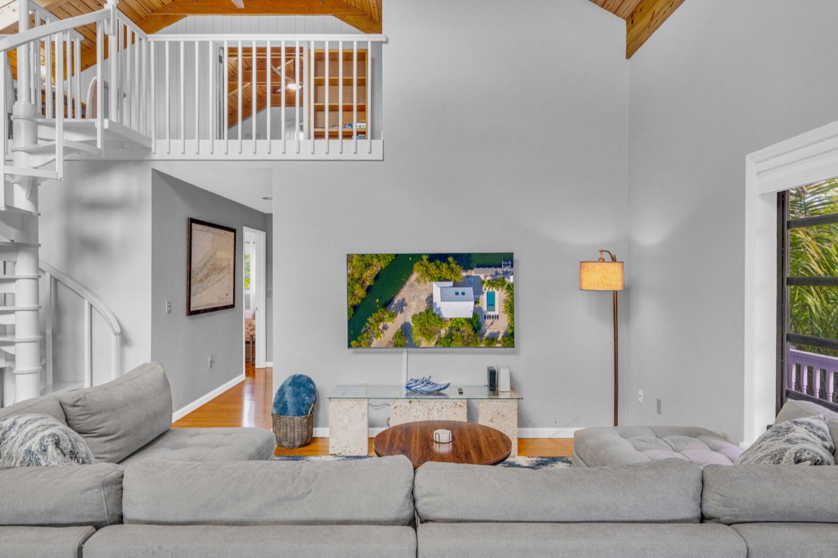 Living room with spiral staircase
